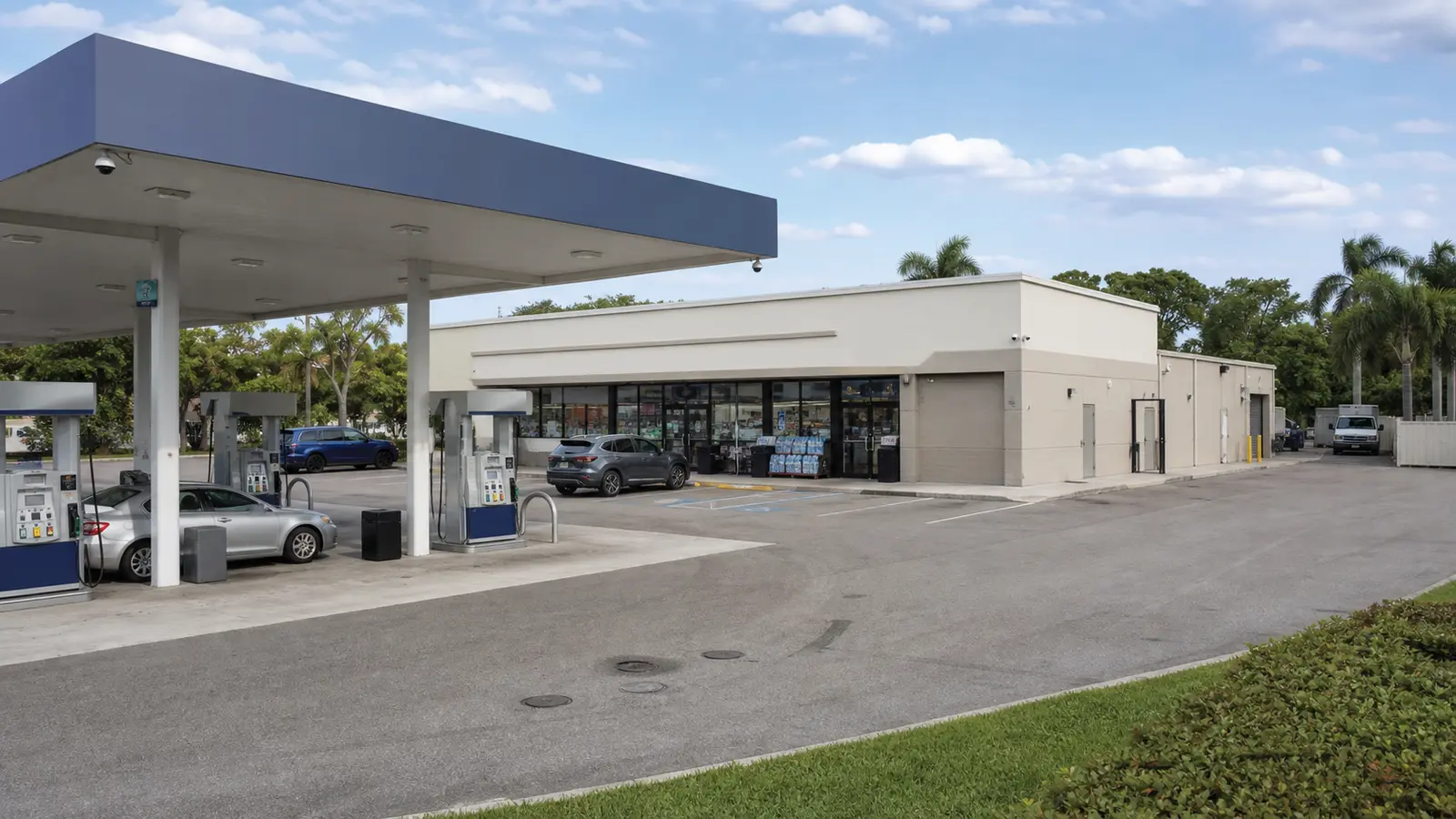 Realistic gas station camera coverage across pumps, store entrance, parking, and service areas