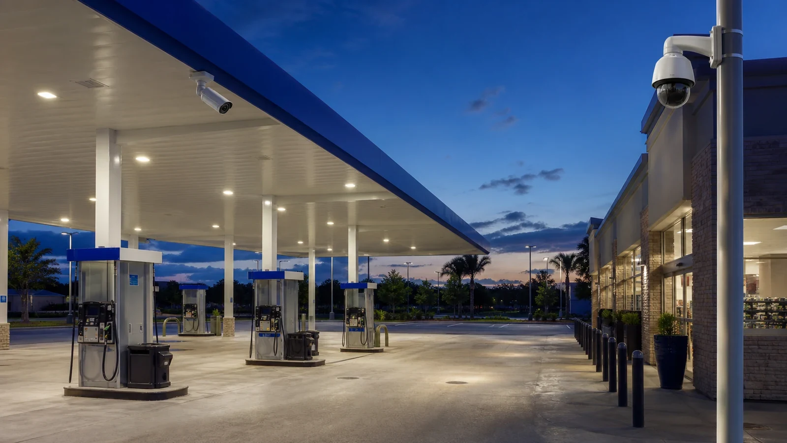 Security camera coverage plan for a Tampa gas station with pumps, POS, parking and rear service areas.